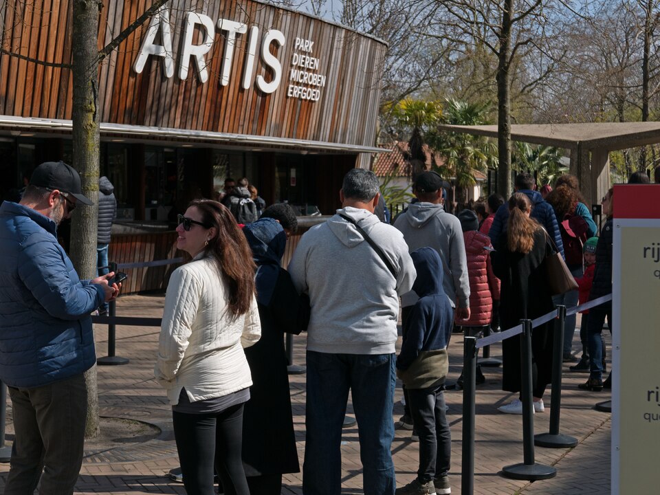 Visitors queueing at the timber entrance of Artis