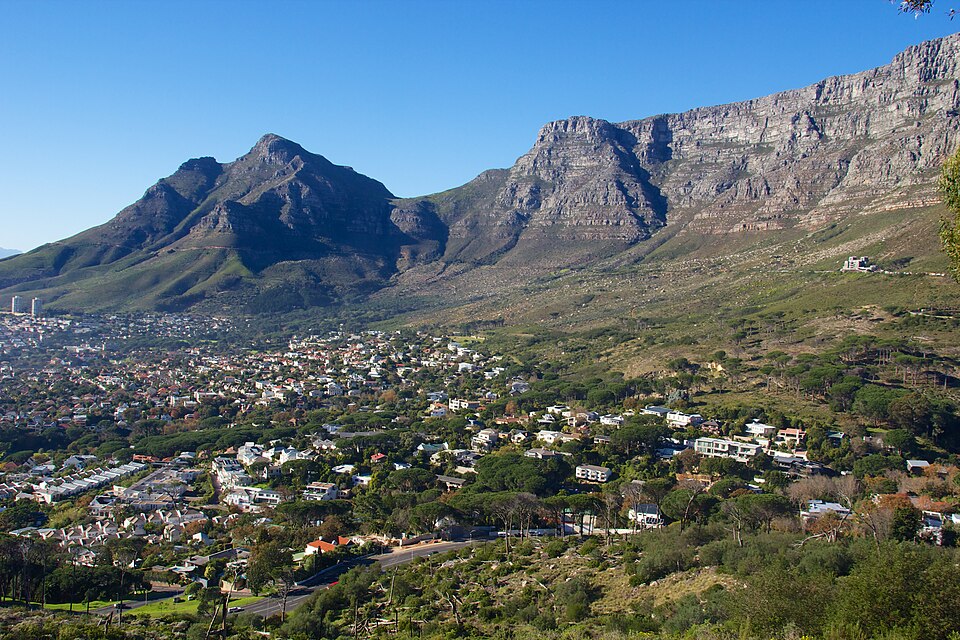 Leafy streets spread below Table Mountain and Devil’s Peak
