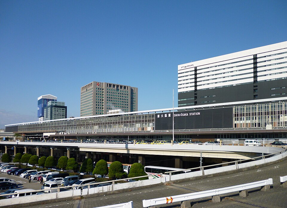 The station frontage above the taxi rank in the sun